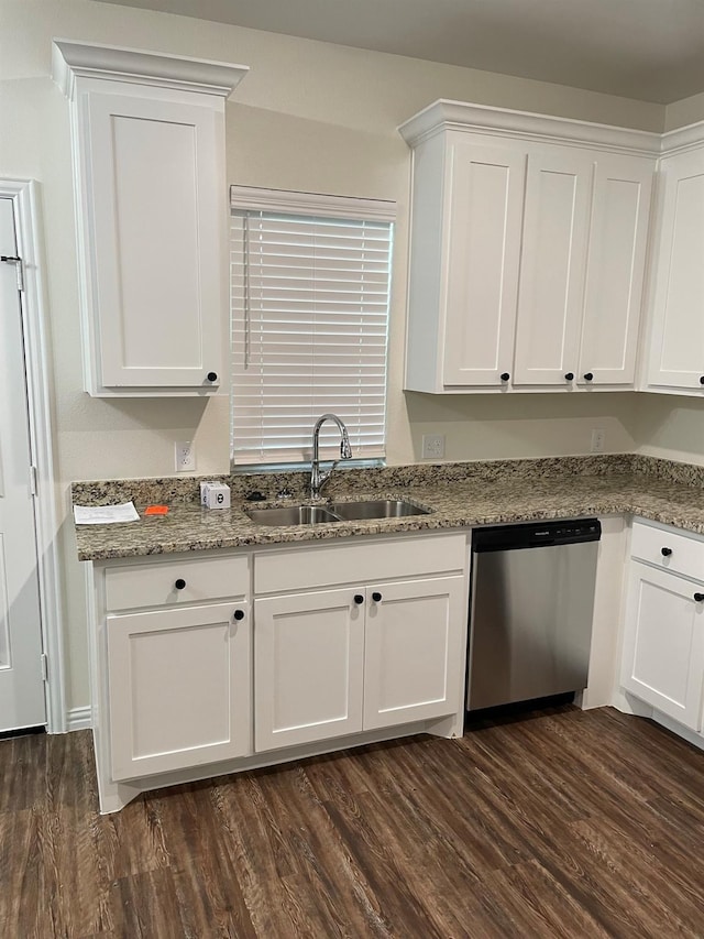 kitchen featuring stone counters, white cabinetry, dishwasher, sink, and dark wood-type flooring