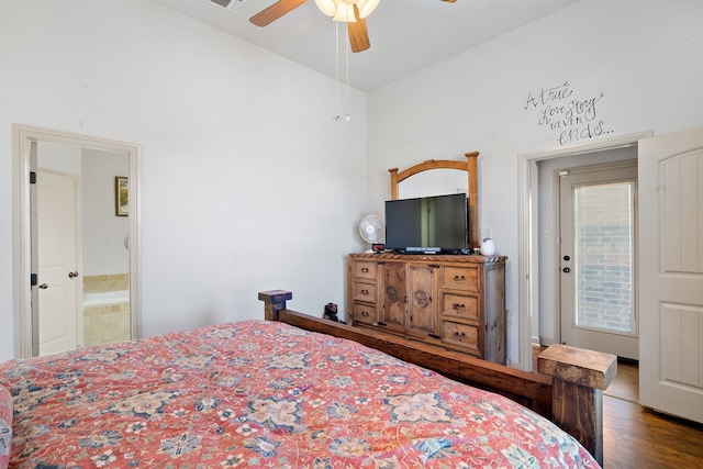 bedroom with ceiling fan and dark wood-type flooring