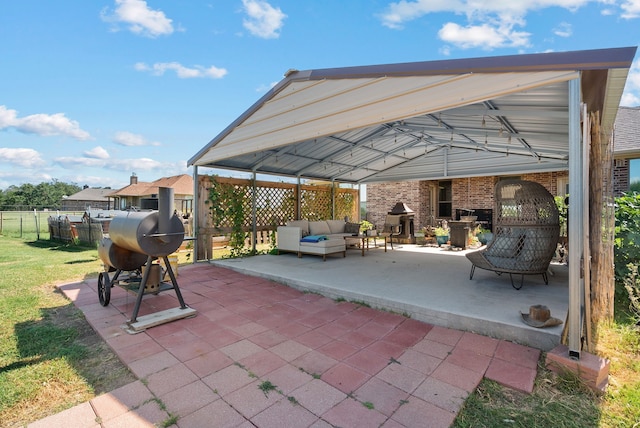 view of patio with a gazebo, an outdoor living space, and grilling area