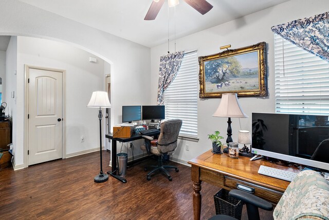 home office featuring ceiling fan and dark hardwood / wood-style floors