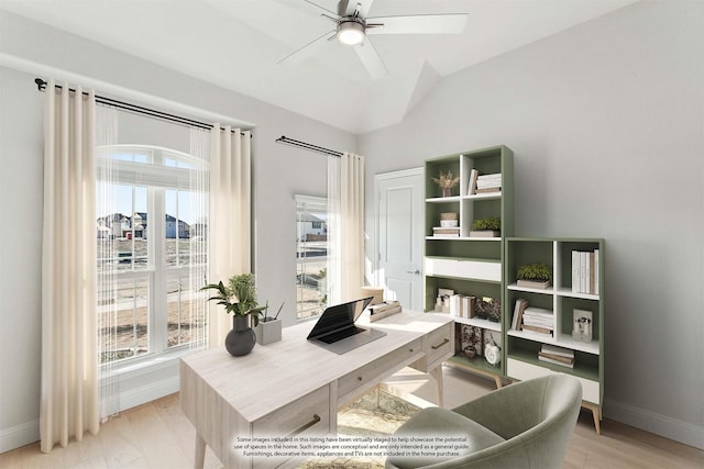 home office featuring ceiling fan, a healthy amount of sunlight, light hardwood / wood-style floors, and vaulted ceiling