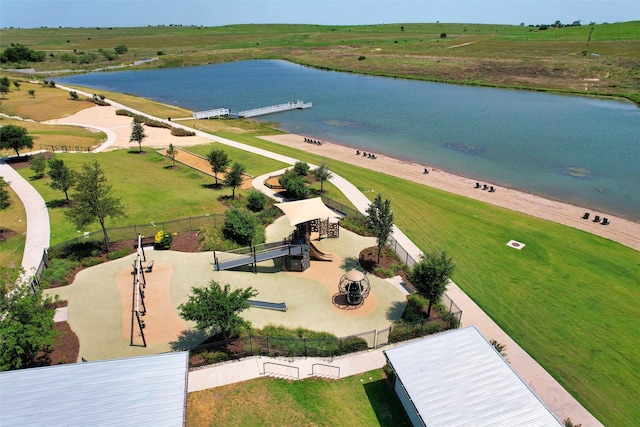 drone / aerial view featuring a rural view and a water view