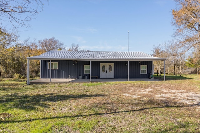 view of front of home featuring a front lawn and a porch