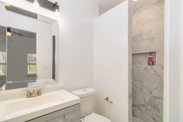 942 County Road 2240, Corsicana, TX 75109 - bathroom featuring toilet, vanity, and tiled shower