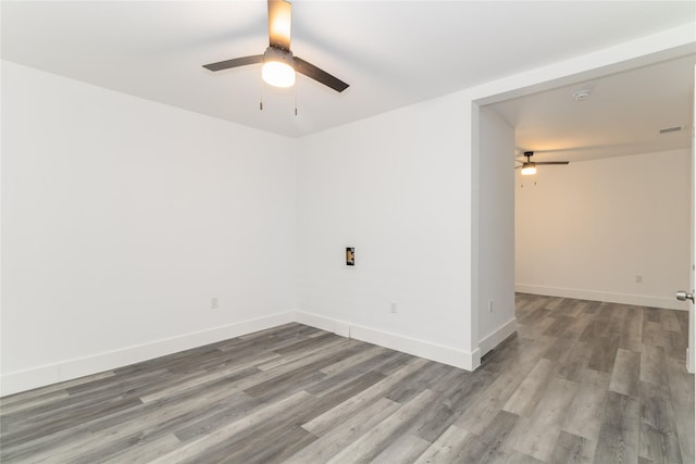 942 County Road 2240, Corsicana, TX 75109 - spare room with ceiling fan, wood finished floors, baseboards, and a smoke detector