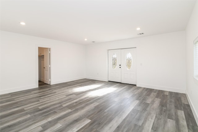 spare room with dark wood-type flooring