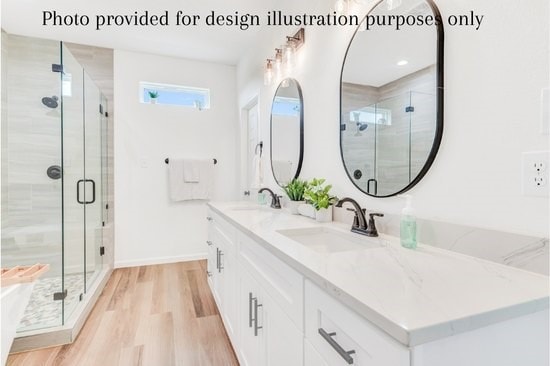 bathroom featuring double vanity, separate shower and tub, and hardwood / wood-style floors