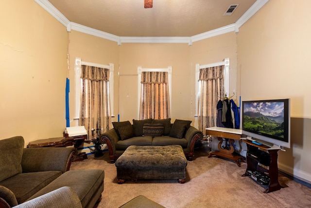 living room with light colored carpet, ceiling fan, and ornamental molding