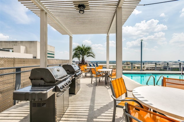 view of patio featuring a community pool, grilling area, and a pergola