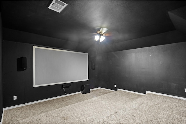 cinema featuring carpet and ceiling fan