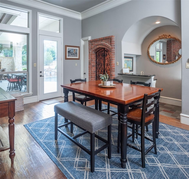 336 Oakwood Trl, Fairview, TX 75069 - dining area with dark wood finished floors, ornamental molding, and baseboards