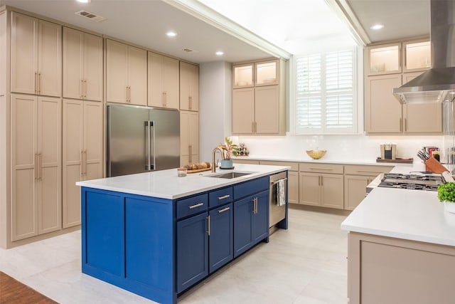 336 Oakwood Trl, Fairview, TX 75069 - kitchen with appliances with stainless steel finishes, a sink, wall chimney exhaust hood, blue cabinets, and light countertops