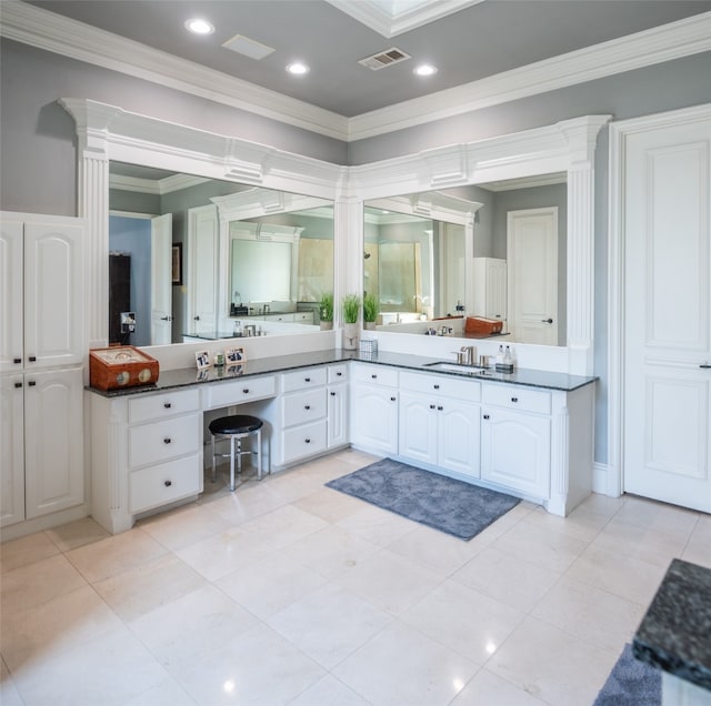 bathroom featuring vanity, tile patterned floors, and ornamental molding