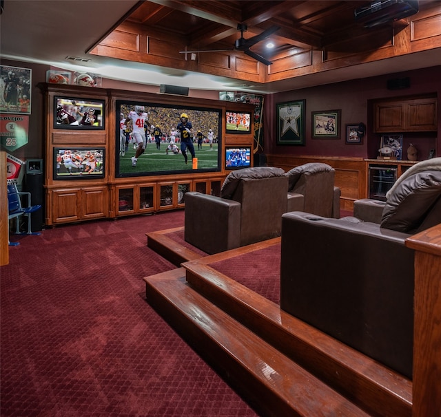 home theater with carpet flooring, beam ceiling, and coffered ceiling