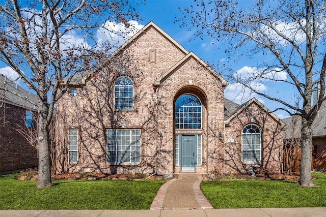 view of front of property with a front lawn