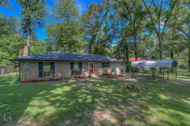 single story home featuring a front lawn and a carport