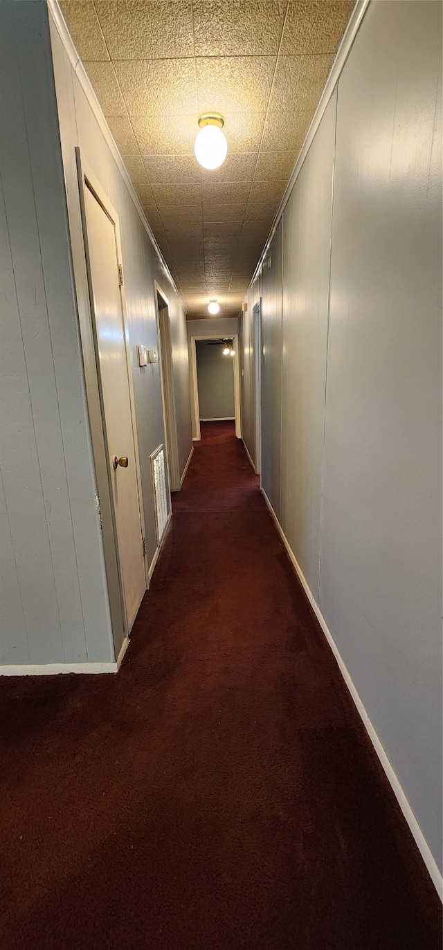 corridor featuring carpet