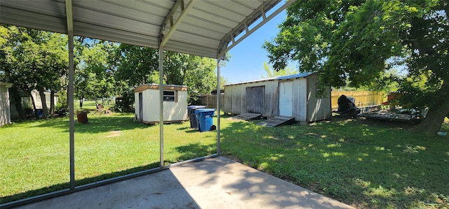 view of yard featuring a patio area and a shed