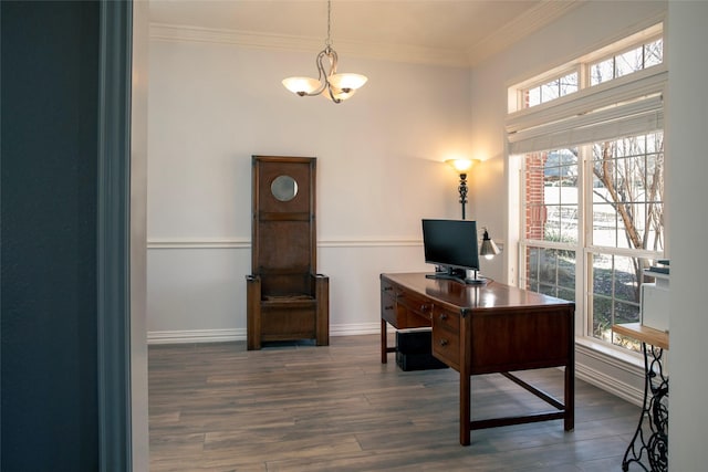 office space with dark hardwood / wood-style floors, crown molding, and an inviting chandelier