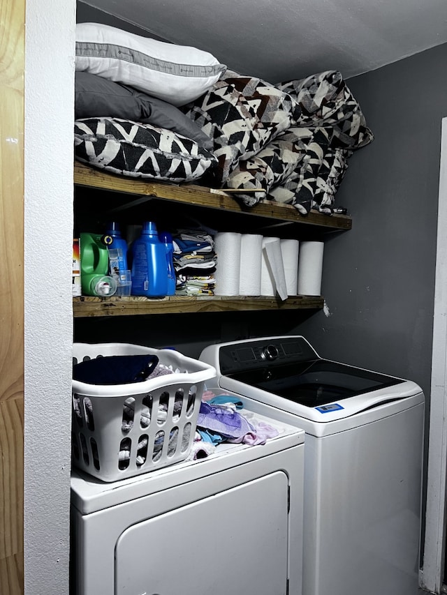 washroom featuring independent washer and dryer