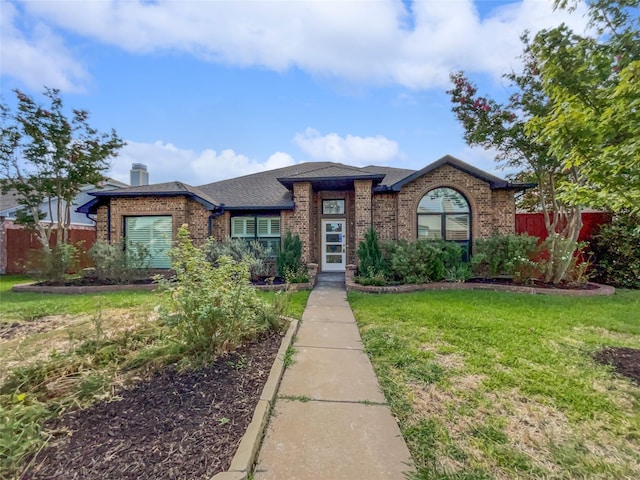 view of front of house with a front lawn