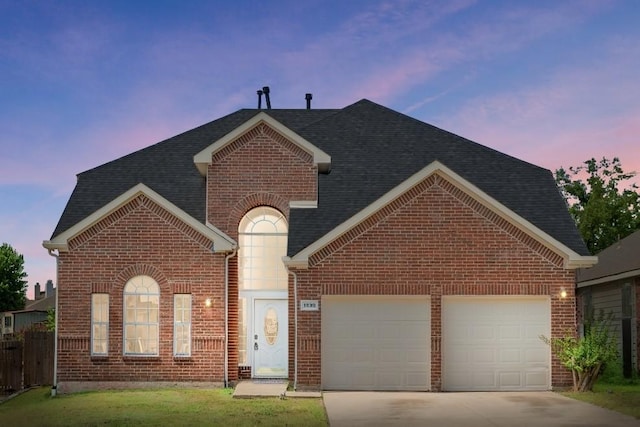 view of front of property with a garage