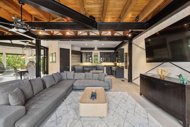 living room featuring beamed ceiling, wooden ceiling, light tile patterned floors, and ceiling fan