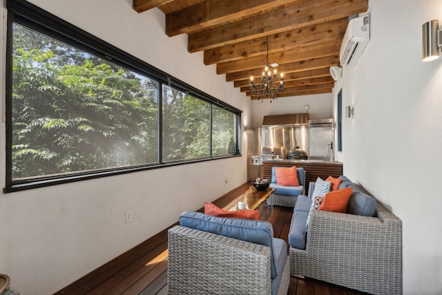 sunroom with wood ceiling, a chandelier, a wall mounted AC, and beam ceiling