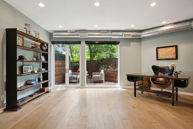 sitting room featuring light wood-type flooring