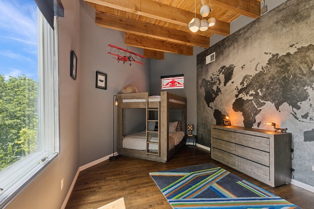 bedroom featuring beamed ceiling, multiple windows, dark hardwood / wood-style flooring, and wooden ceiling