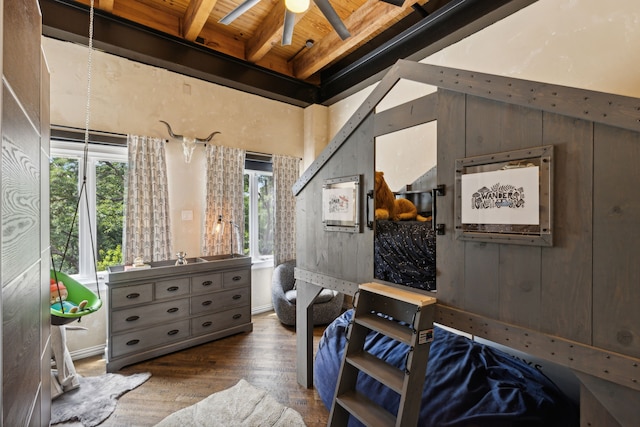 interior space featuring plenty of natural light, wood ceiling, ceiling fan, and beam ceiling