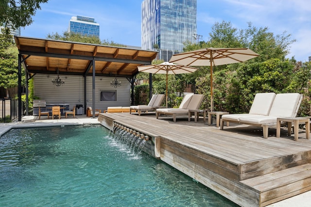 view of swimming pool featuring pool water feature