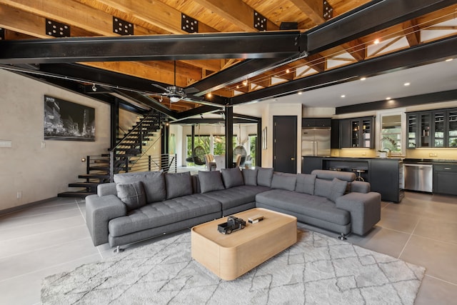 tiled living room with wooden ceiling, beam ceiling, and ceiling fan