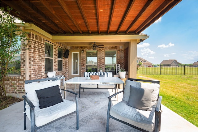 view of patio featuring ceiling fan