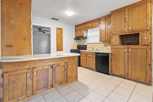 kitchen featuring black appliances, ceiling fan, light tile patterned floors, and sink