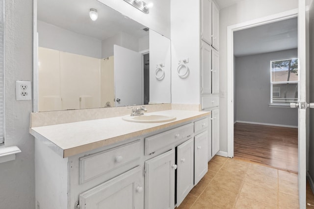 bathroom featuring vanity and tile patterned floors