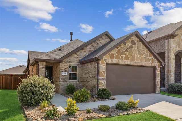 view of front of property featuring a garage