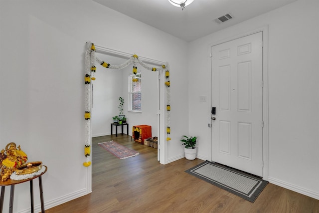 entrance foyer featuring hardwood / wood-style flooring