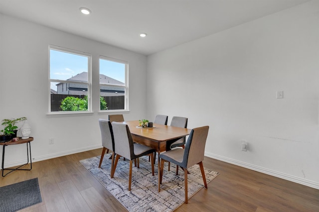 dining area featuring hardwood / wood-style flooring