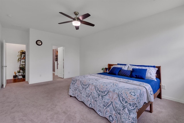 bedroom with ceiling fan and carpet flooring