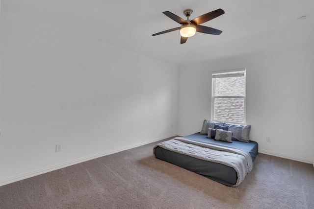 bedroom with ceiling fan and carpet flooring