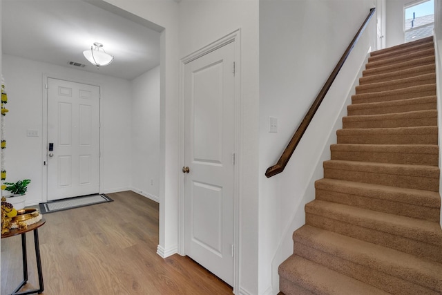 entrance foyer with light hardwood / wood-style floors