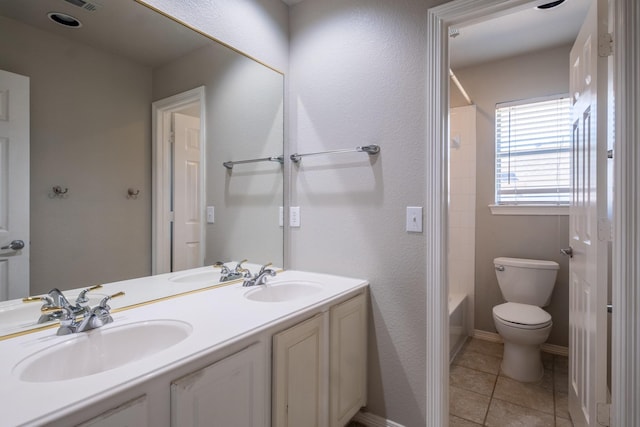 full bathroom with shower / bathtub combination, vanity, toilet, and tile patterned flooring