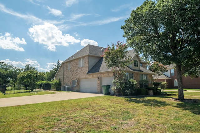 view of front facade with central AC unit, a garage, and a front lawn