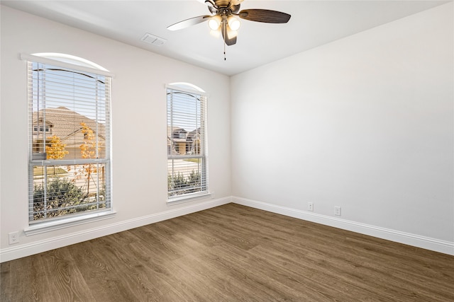 unfurnished room featuring hardwood / wood-style floors and ceiling fan