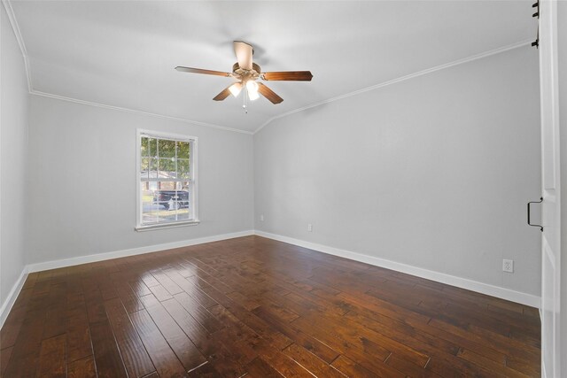 empty room with ceiling fan, baseboards, dark wood-style flooring, and ornamental molding