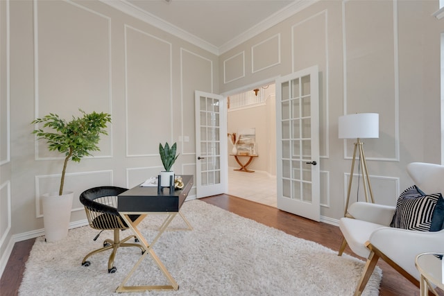 office area featuring crown molding, hardwood / wood-style flooring, and french doors