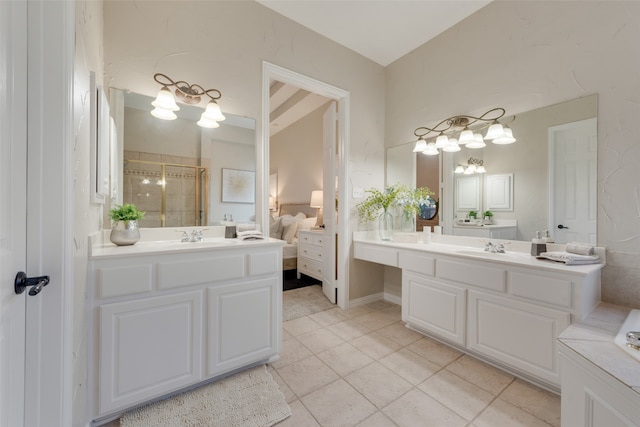 bathroom featuring tile patterned floors and double sink vanity