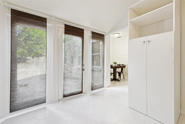 entryway featuring light tile patterned floors