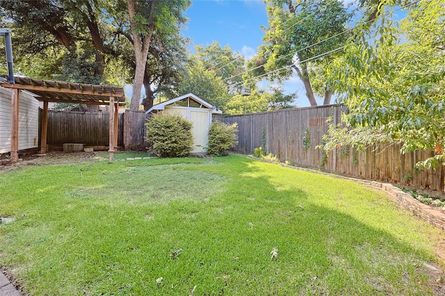 view of yard featuring a pergola and a storage shed